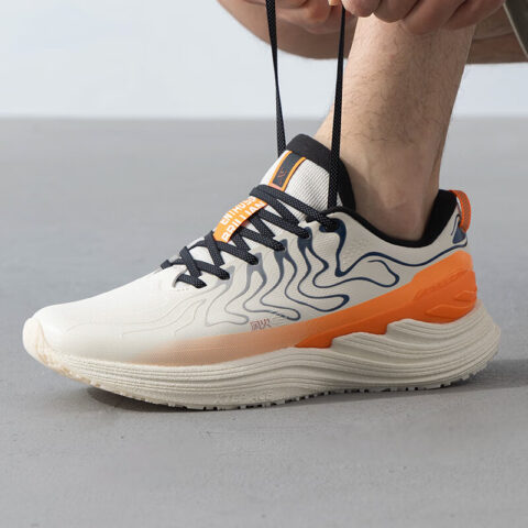 XTEP Slip Resistant, Abrasion Resistant, Breathable Low top Casual Running Shoes Men’s Beige Orange